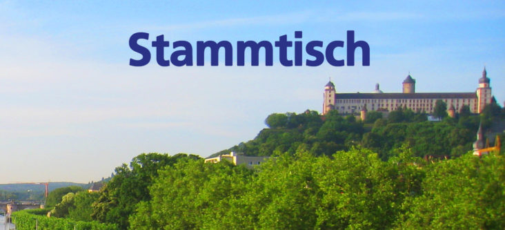 Das Foto zeigt den Main und die Würzburger Festung. Text: „Stammtisch“